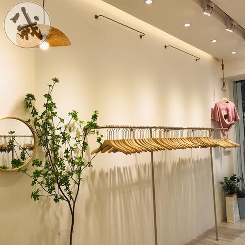 巧妙利用墻壁空間 服裝店掛衣桿的裝修設(shè)計(jì)指南